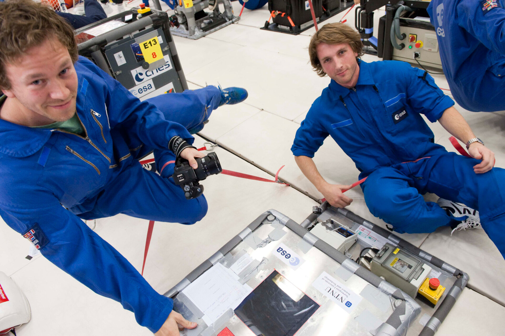 Students working in microgravity