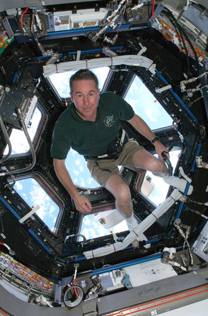 Astronaut Stephen Robinson in the Cupola