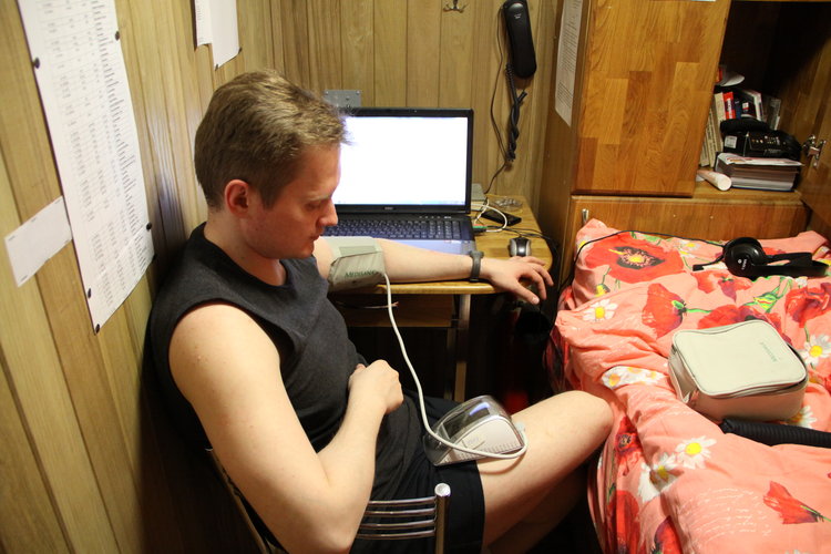 Aleksandr measuring blood pressure