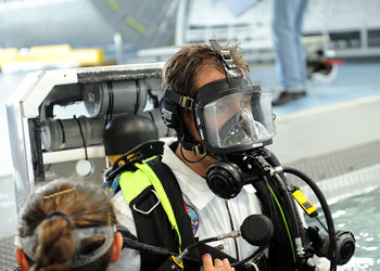 Thomas with a full-face diving mask used in training