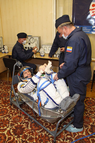 Paolo Nespoli in preflight suit fit checks