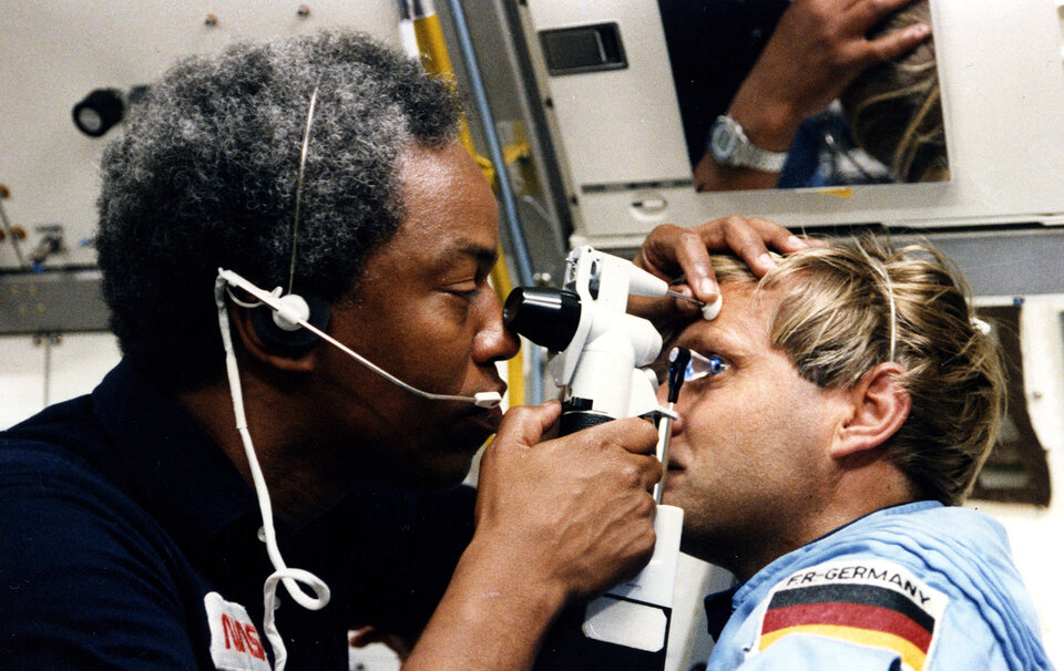 Guy Bluford carries out medical checks on Messerschmid