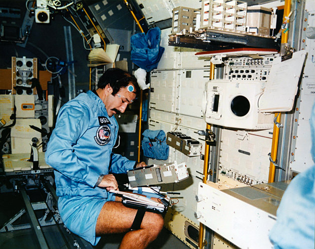 Wubbo Ockels working in Spacelab D1 during the STS-61A flight