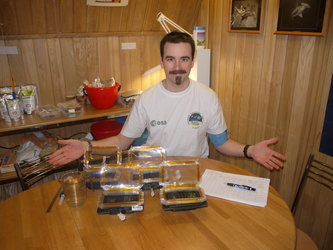 Romain with the greenhouses