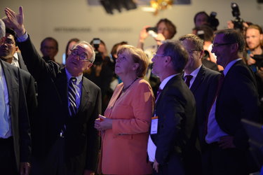 Angela Merkel and Jean-Jacques Dordain visit the exhibition