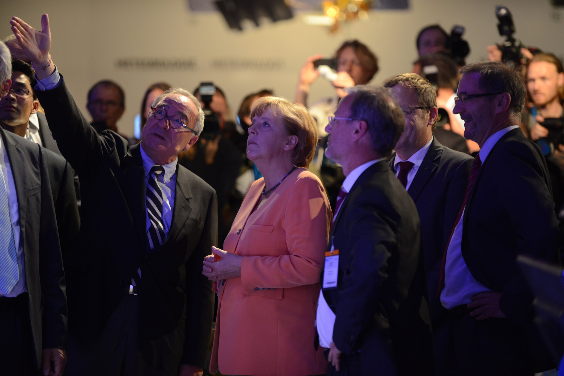 German Chancellor, A. Merkel visits the space pavilion with ESA DG J.J. Dordain