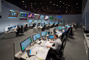 Mission controllers at work in the Main Control Room, ESOC, Germany