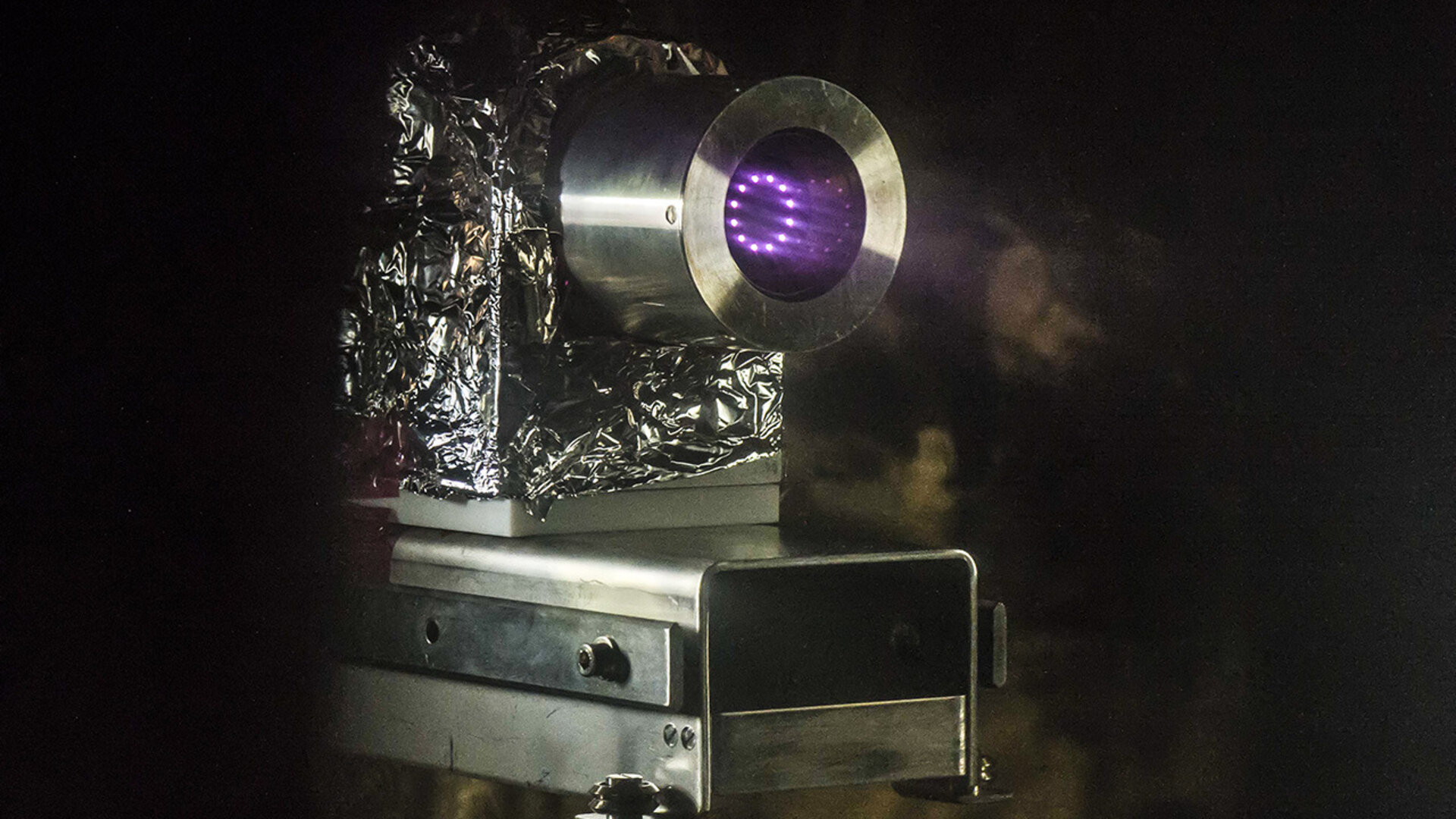MiniRIT thruster being tested
