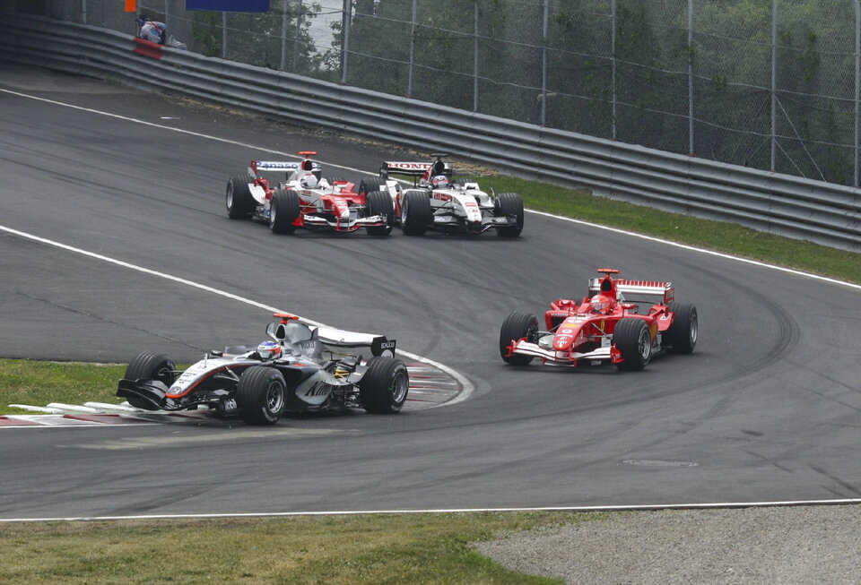 McLaren and Ferrari competing