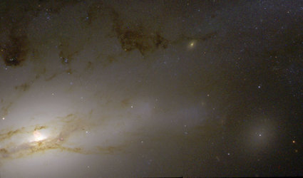 Active galaxy NGC 4438 in the Virgo Cluster, 50 million light-years from Earth