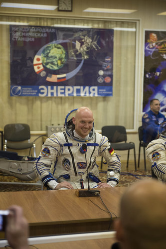 Alexander Gerst dressed in his Russian Sokol suit