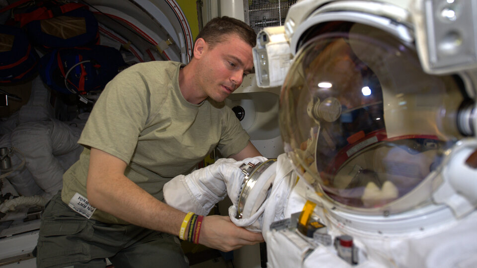 Reid preparing spacesuit