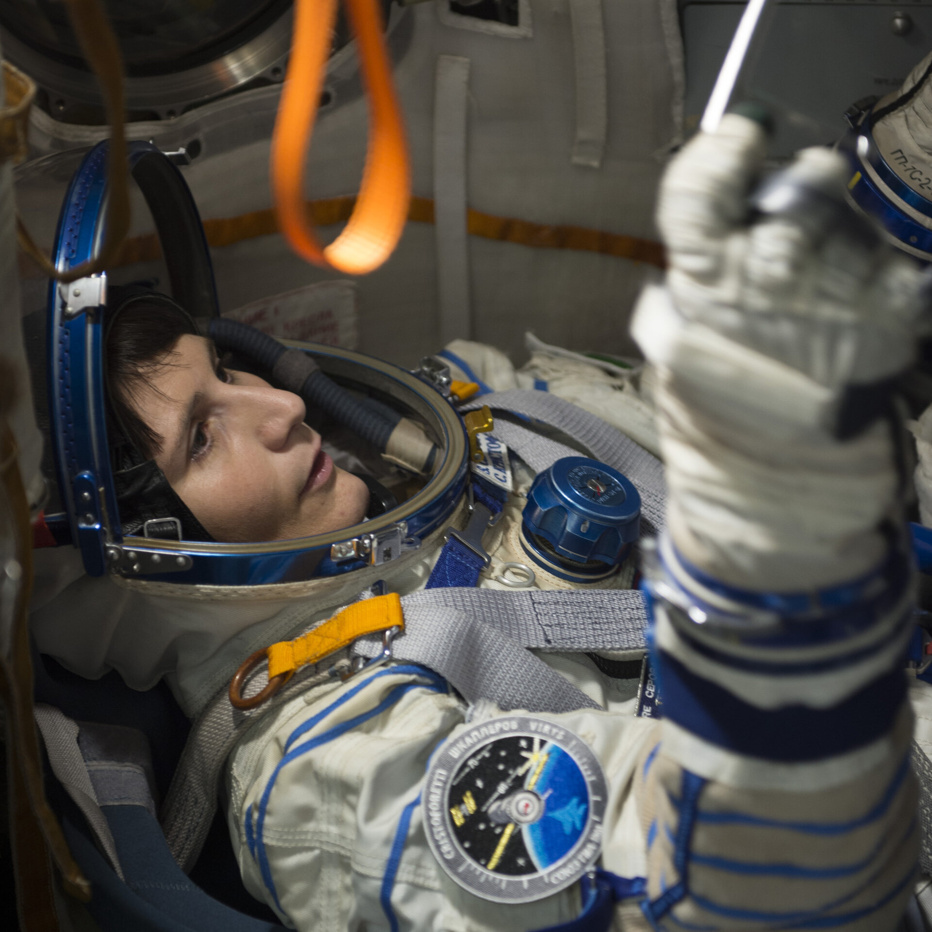 Samantha during training in the full-scale mockup of the Soyuz capsule