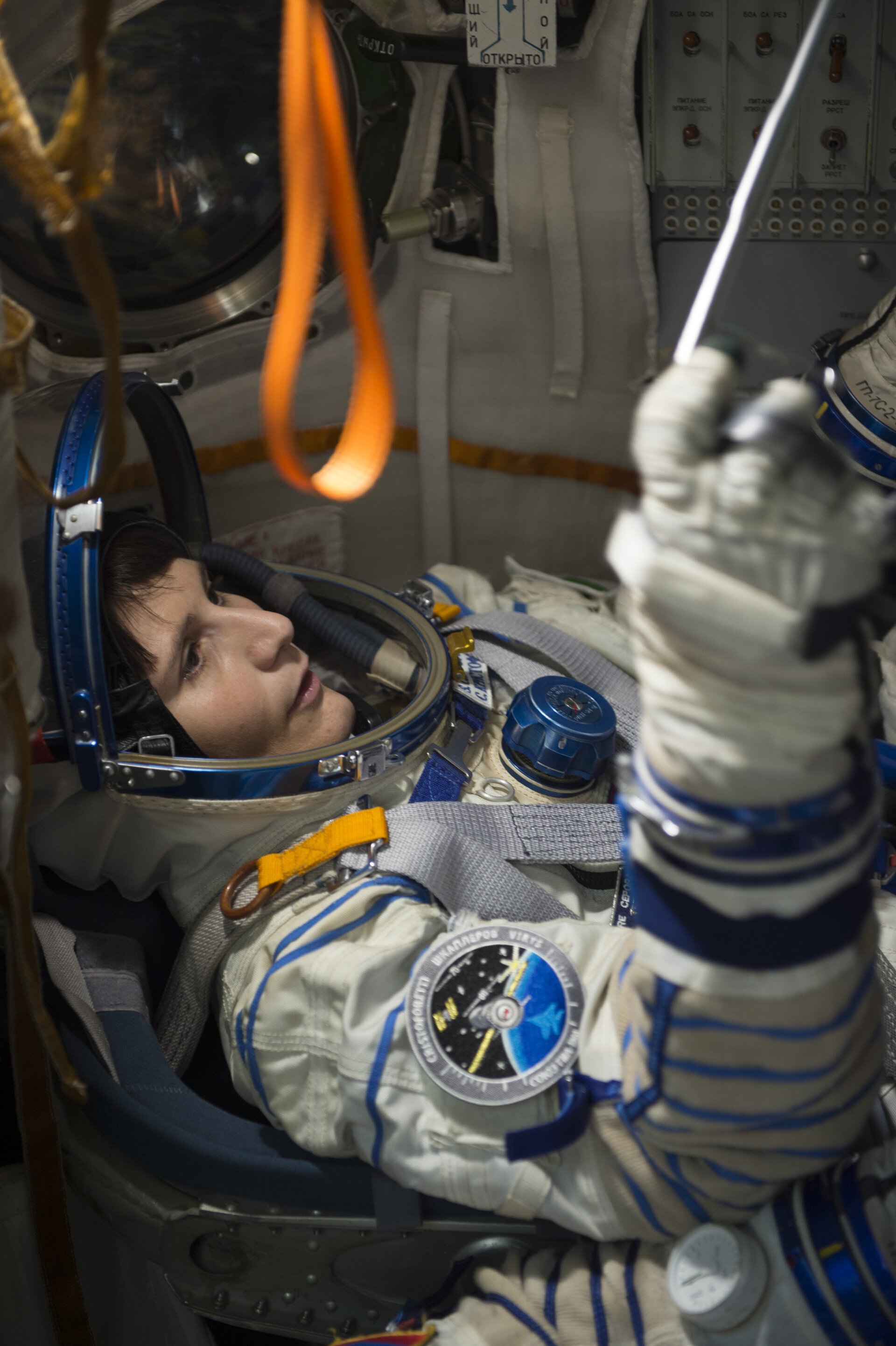 Samantha during training in the full-scale mockup of the Soyuz capsule