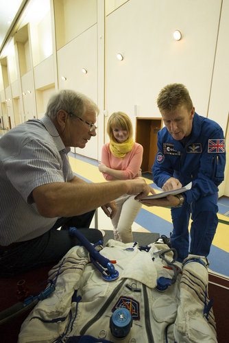 Timothy during the preparation for the simulation inside the Soyuz capsule