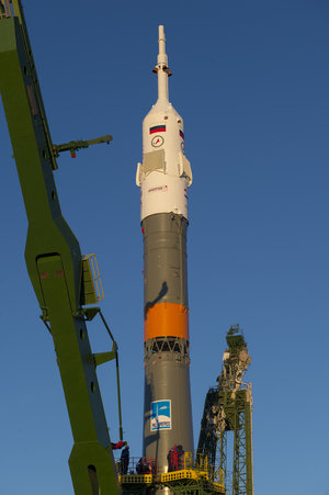 Soyuz moved into vertical position