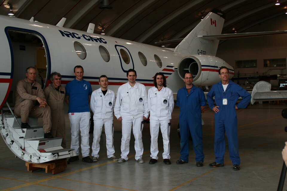 Team boarding aircraft