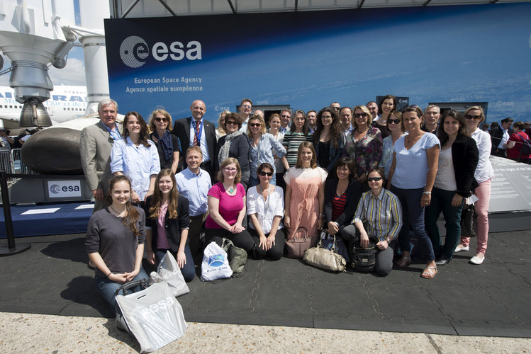 ESA staffs in front of the ESA pavilion