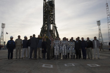 Soyuz TMA-18M crew members and dignitaries at the launch pad