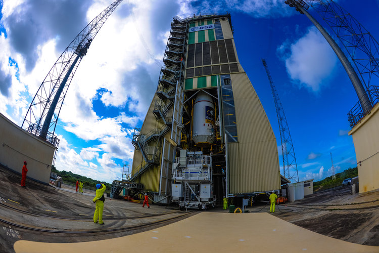 Upper composite being hoisted