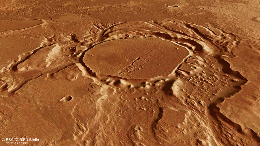 Perspective view of eroded crater in Mangala Valles