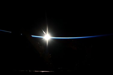 Space Station emerges from the darkness