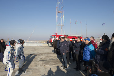 Igor Komarov and the Soyuz TMA-19M crew members