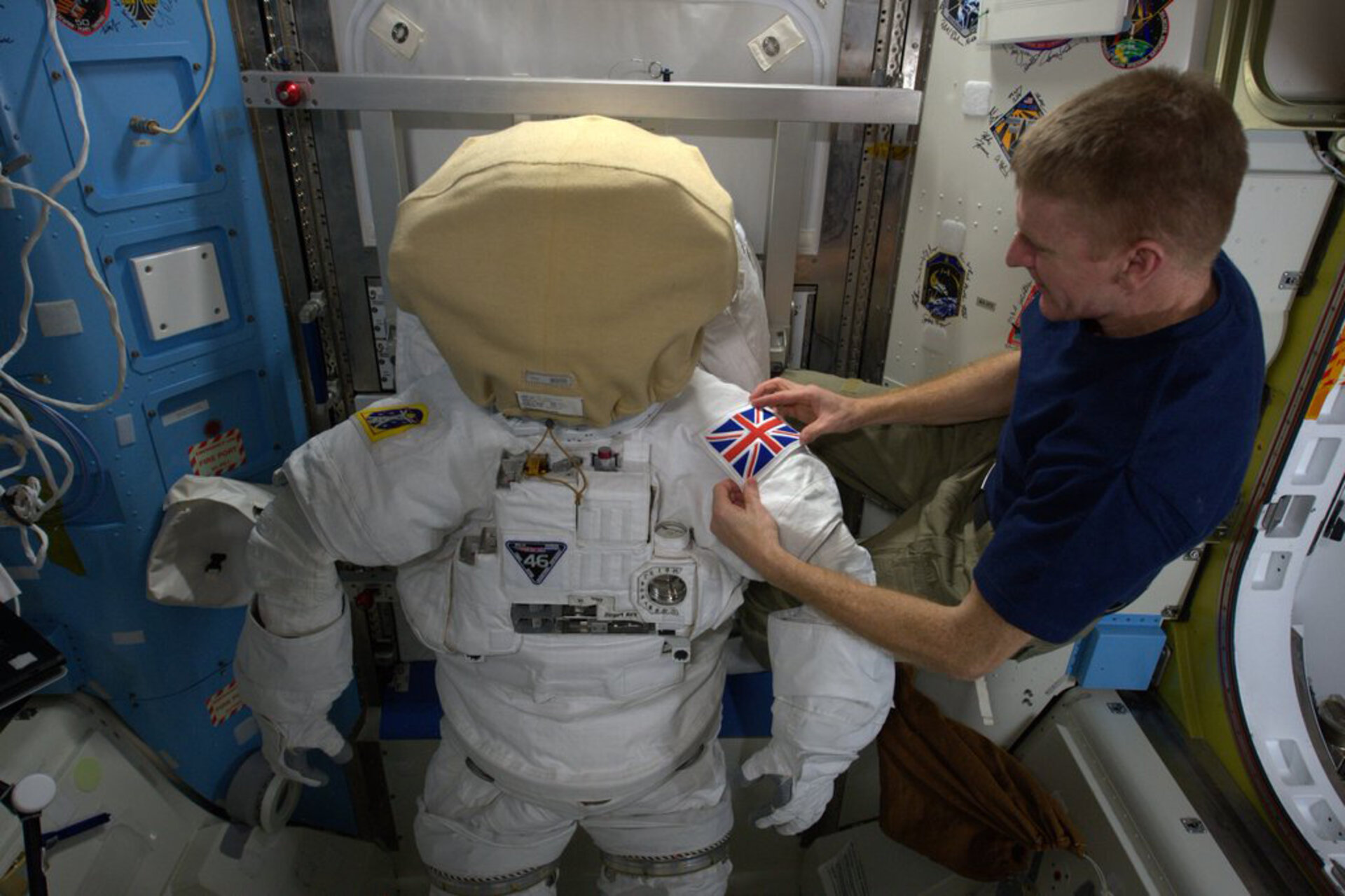Tim Peake prepares his spacesuit