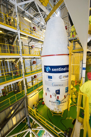 Soyuz VS14 upper composite hoisted to the top of the service tower