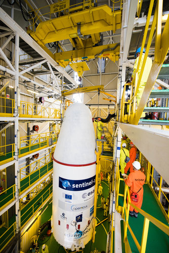 Soyuz VS14 upper composite hoisted to the top of the service tower