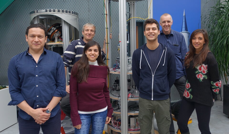 Break Team with ZARM engineers and their experiment setup in the background