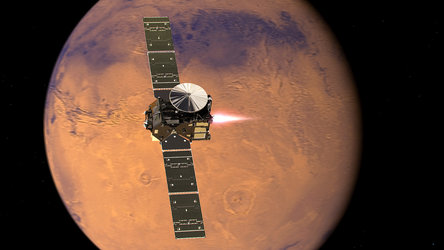 This picture shows what the Trace Gas Orbiter will look like when its thrusters are firing, moving it into orbit around Mars