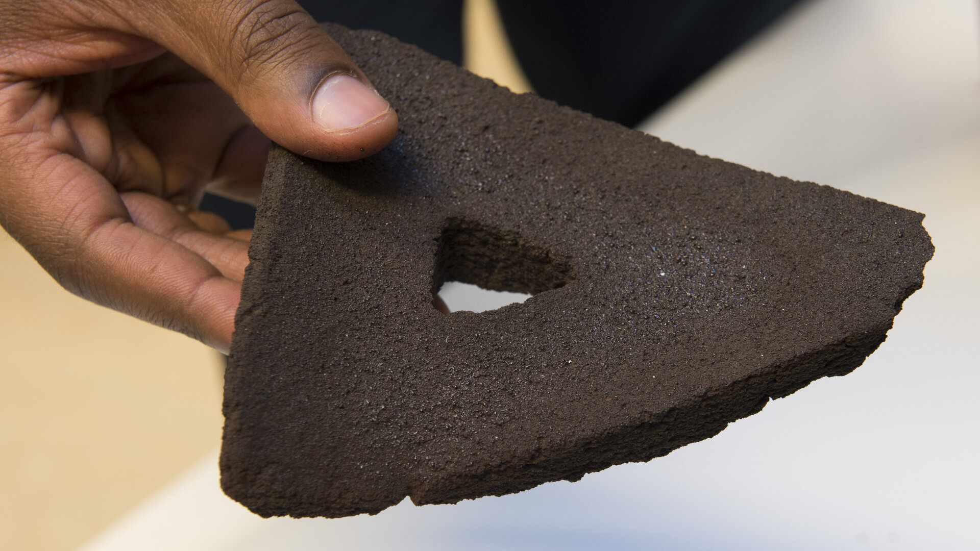 Brick 3D printed from moondust using focused sunlight