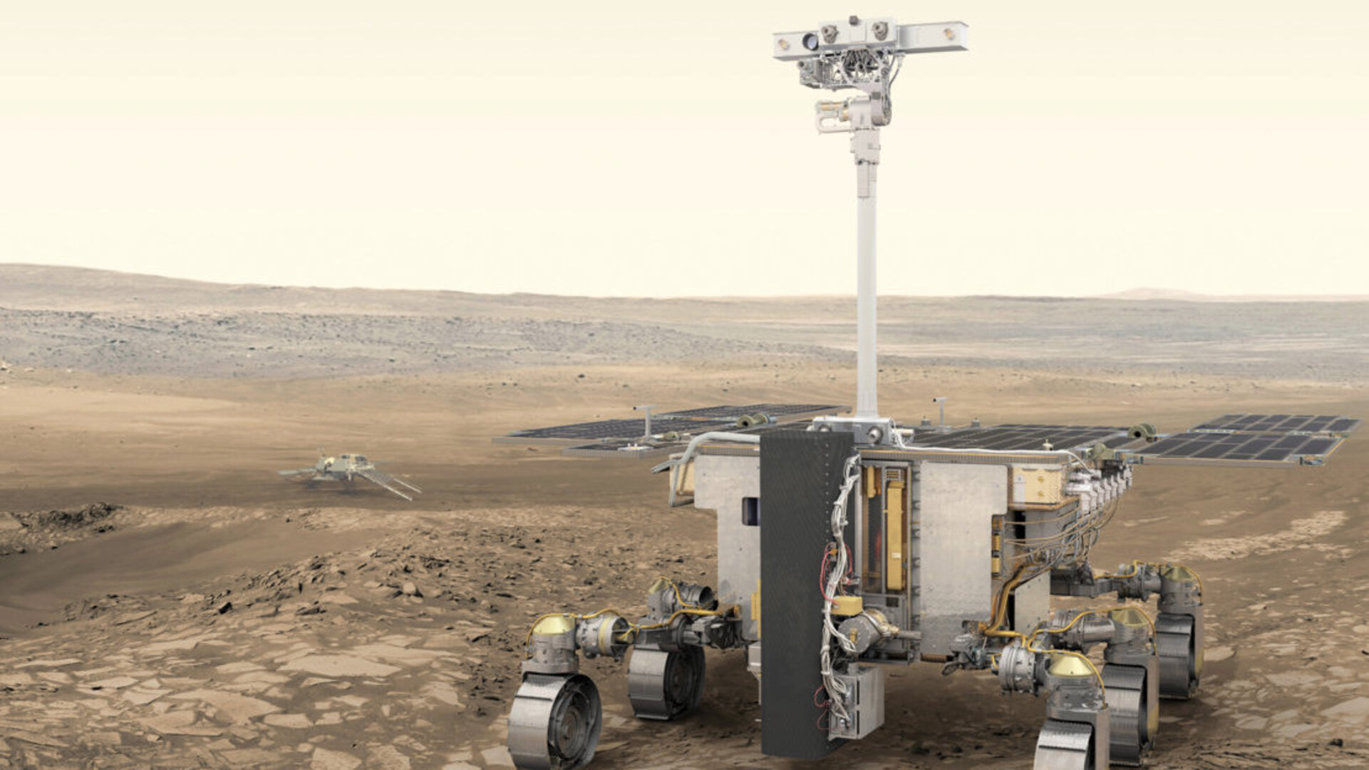ExoMarsi kulgur. Kaugemal vasakul on pinnaseuurimise platvorm, millega kulgur Marsile maandus ning sealt maha sõitis. Kujutis: ESA/ATG 