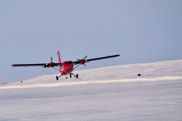 Twin Otter heads off over Arctic Ocean