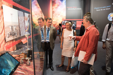 Isabelle Duvaux-Béchon shows Dominique Tilmans the ESA Pavilion