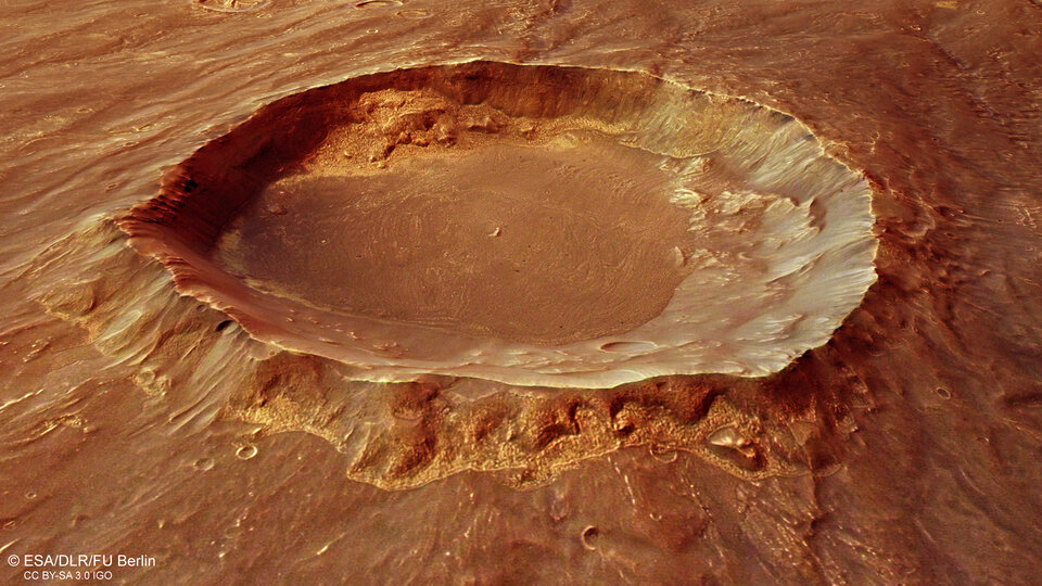 Vista en perspectiva de un cráter en la cordillera de Thaumasia
