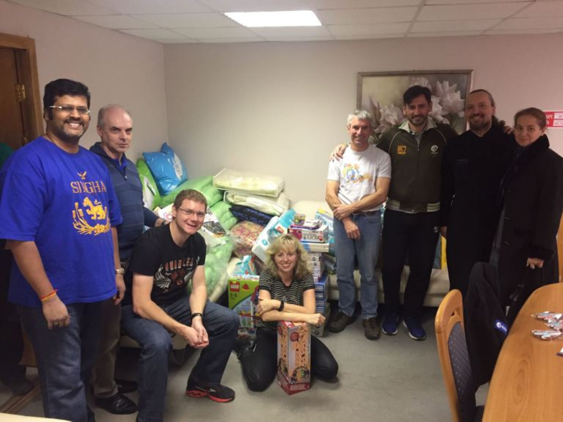 Sentinel-5P Plesetsk team with items for local children's home