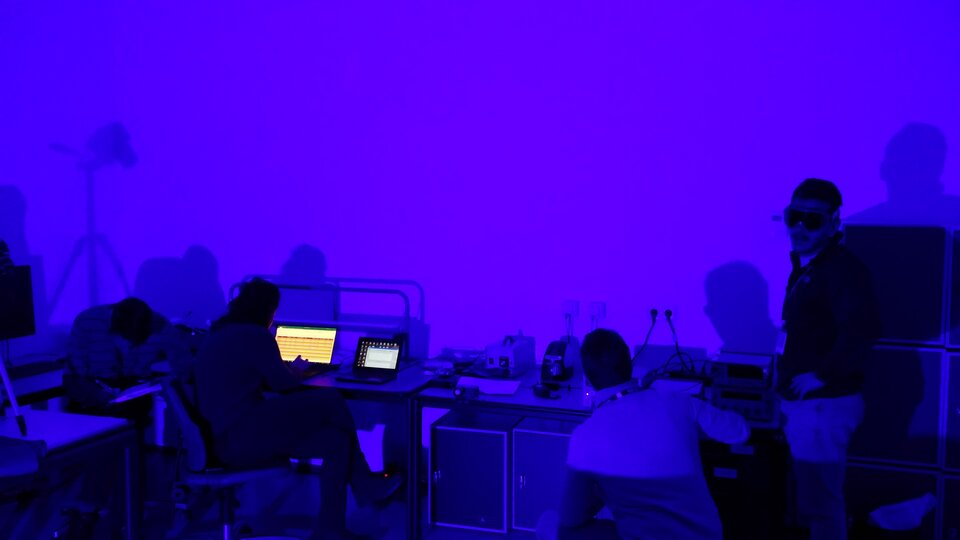 The LEDSAT team measuring the light intensity of the blue LEDs 