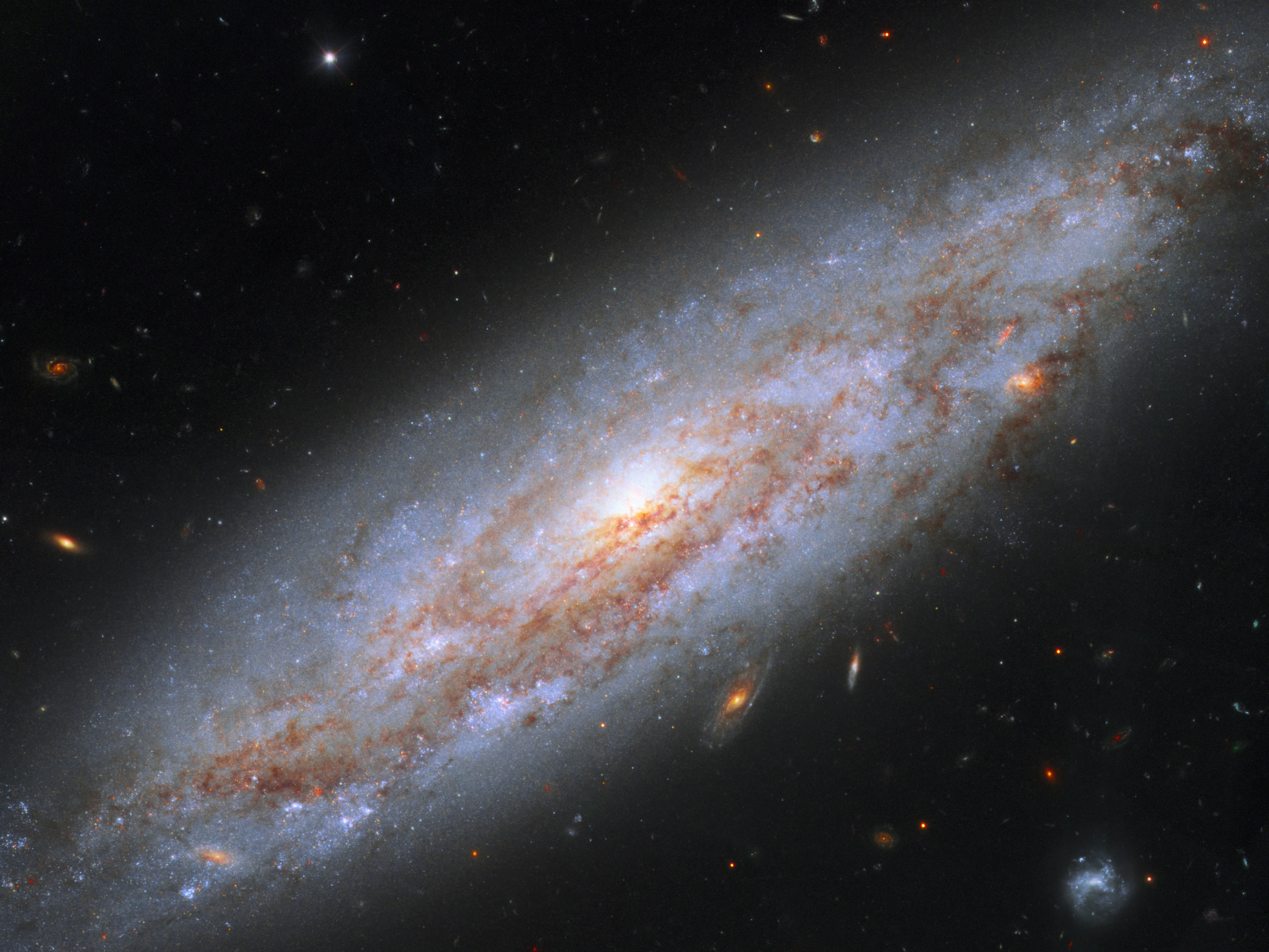 ESA - Galaxy of cosmic lighthouses