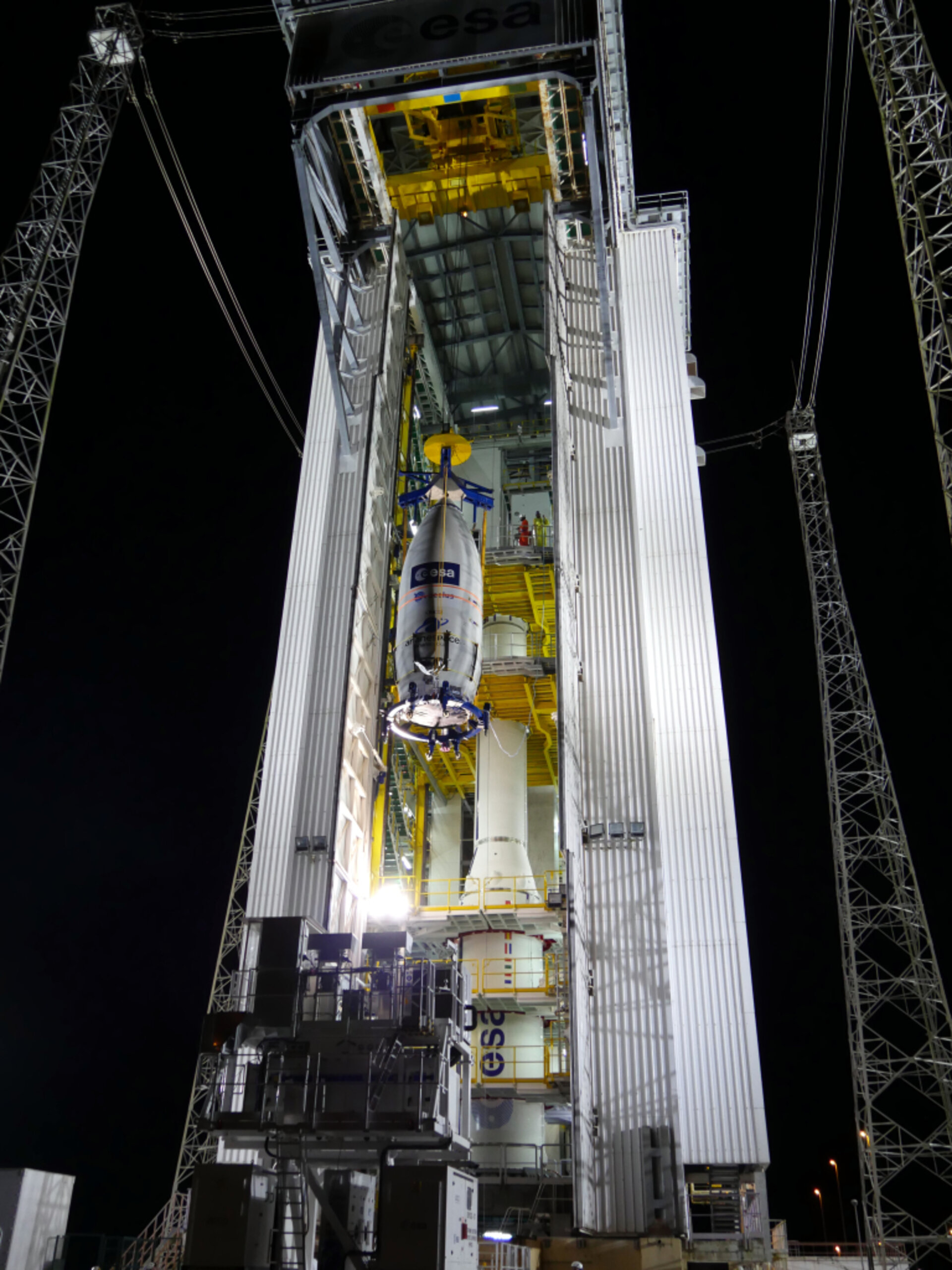 hoisted into the launch tower 