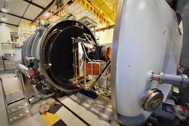 Loading Cheops into a thermal-vacuum chamber
