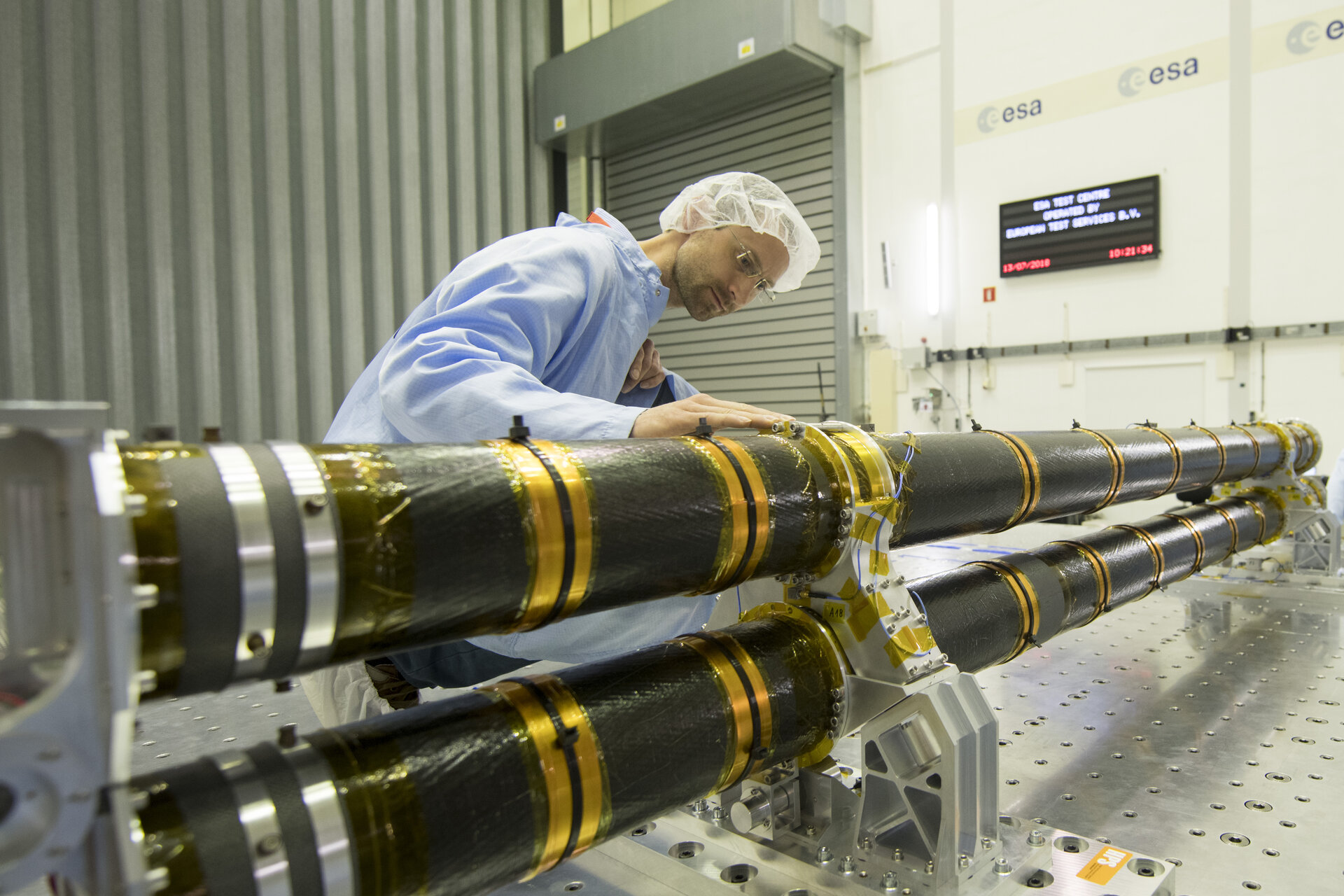 Shaker testing of an articulated deployable boom demonstrator