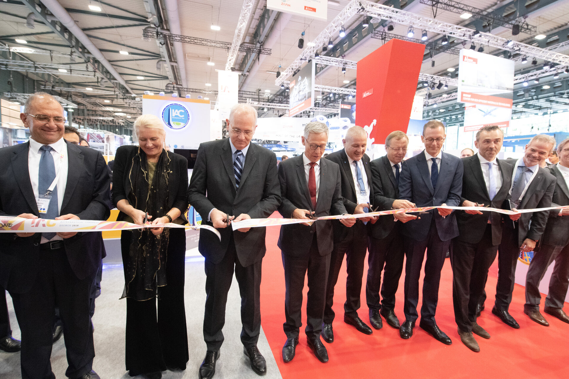 Dignitaries open the exhibition area at IAC 2018