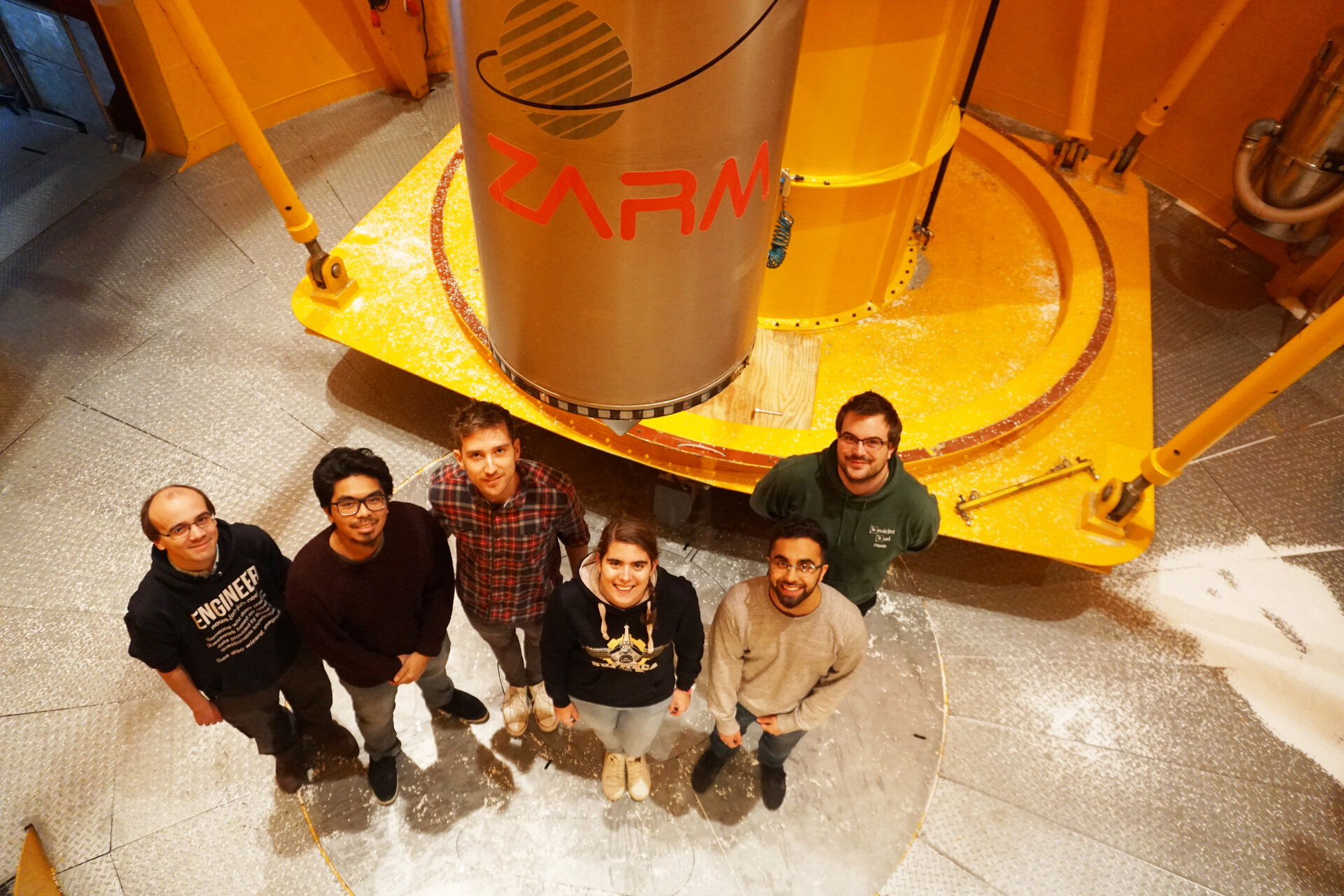 Land3U Team posing in front of their integrated capsule