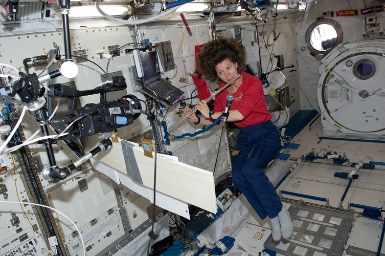 Playing the flute in space