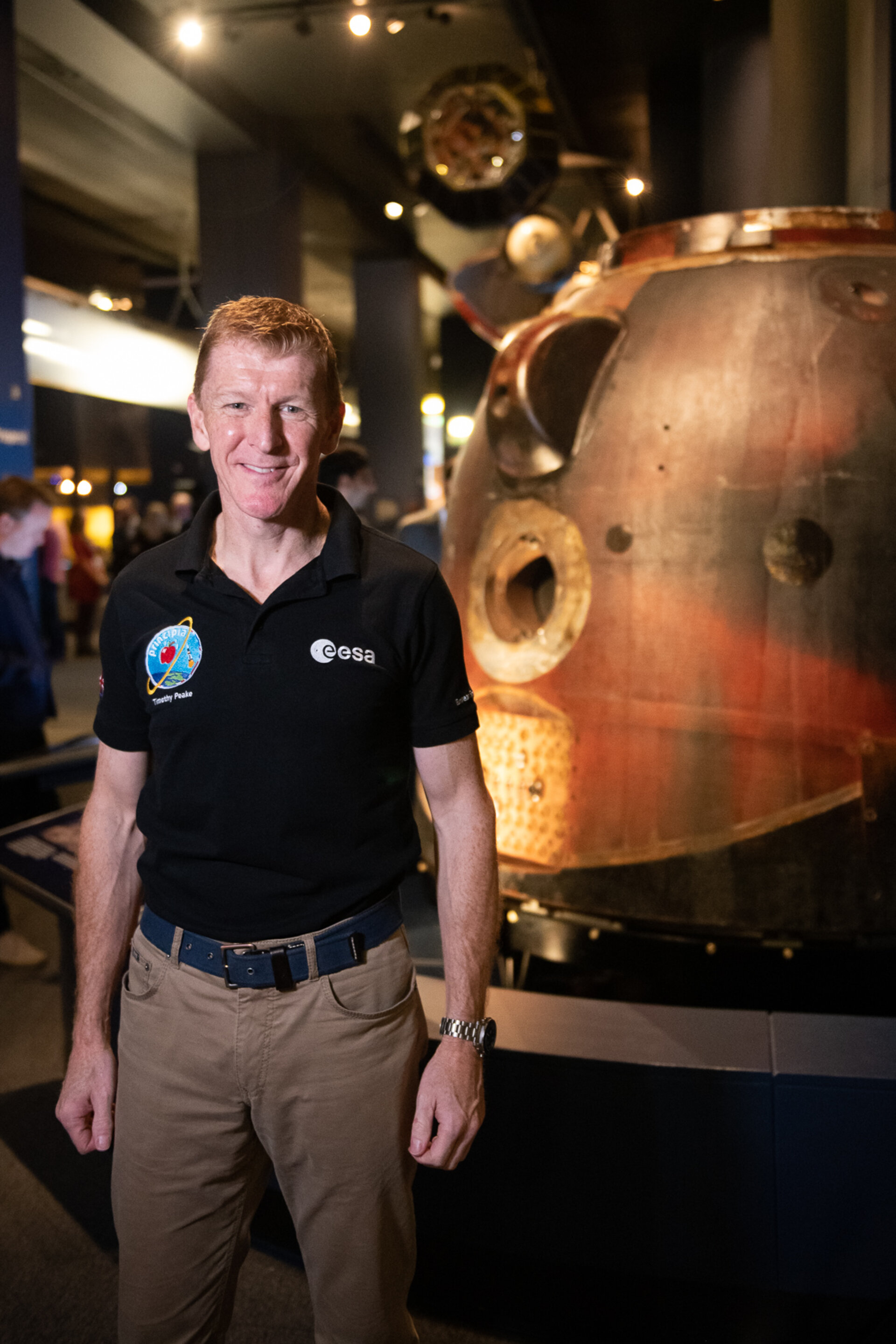 Tim Peake with the Soyuz descent module at the Science Museum in London