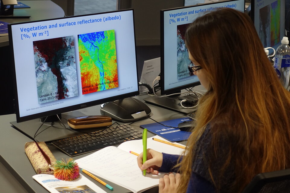 Student working in teams on remote sensing images