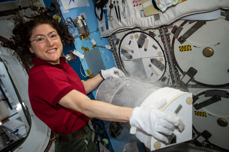 Christina Koch with science freezer