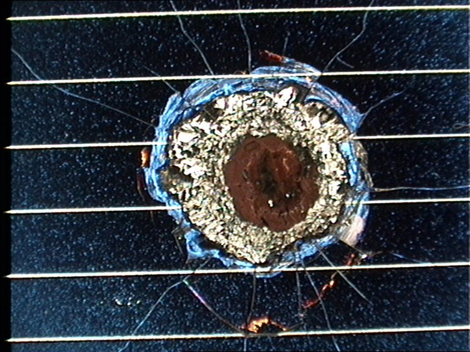 Hubble solar cell impact damage